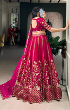 Rich Natural Silk with golden embroidery, glowing in vibrant pink elegance.