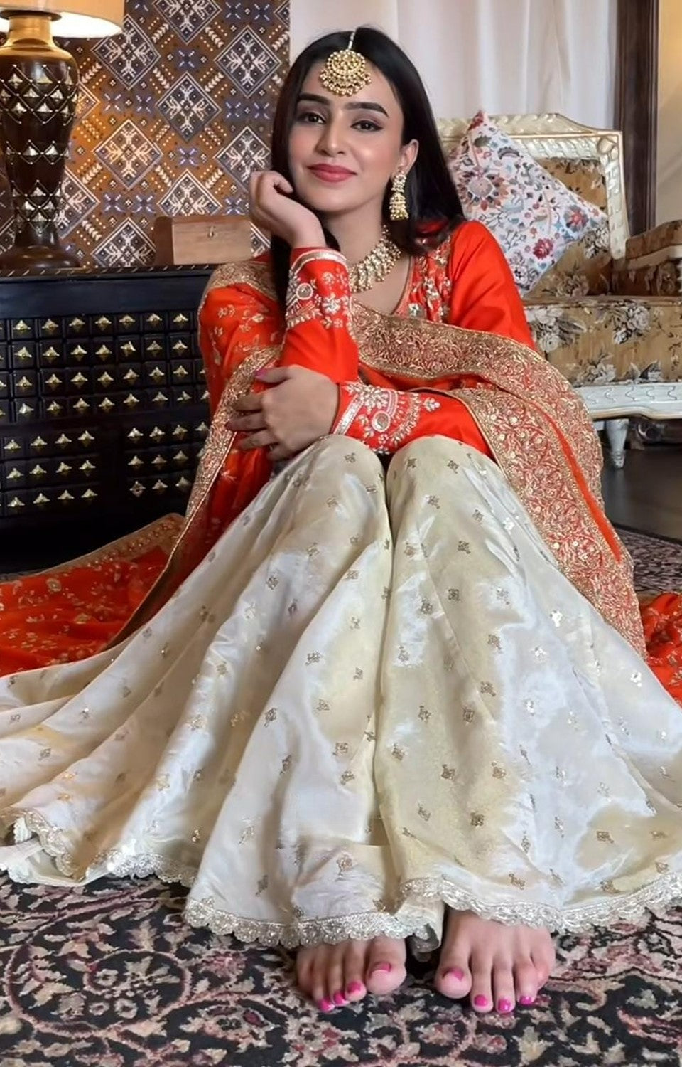 Vibrant Orange suit, contrasting garara, and stylish dupatta