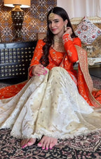 Vibrant Orange suit, contrasting garara, and stylish dupatta