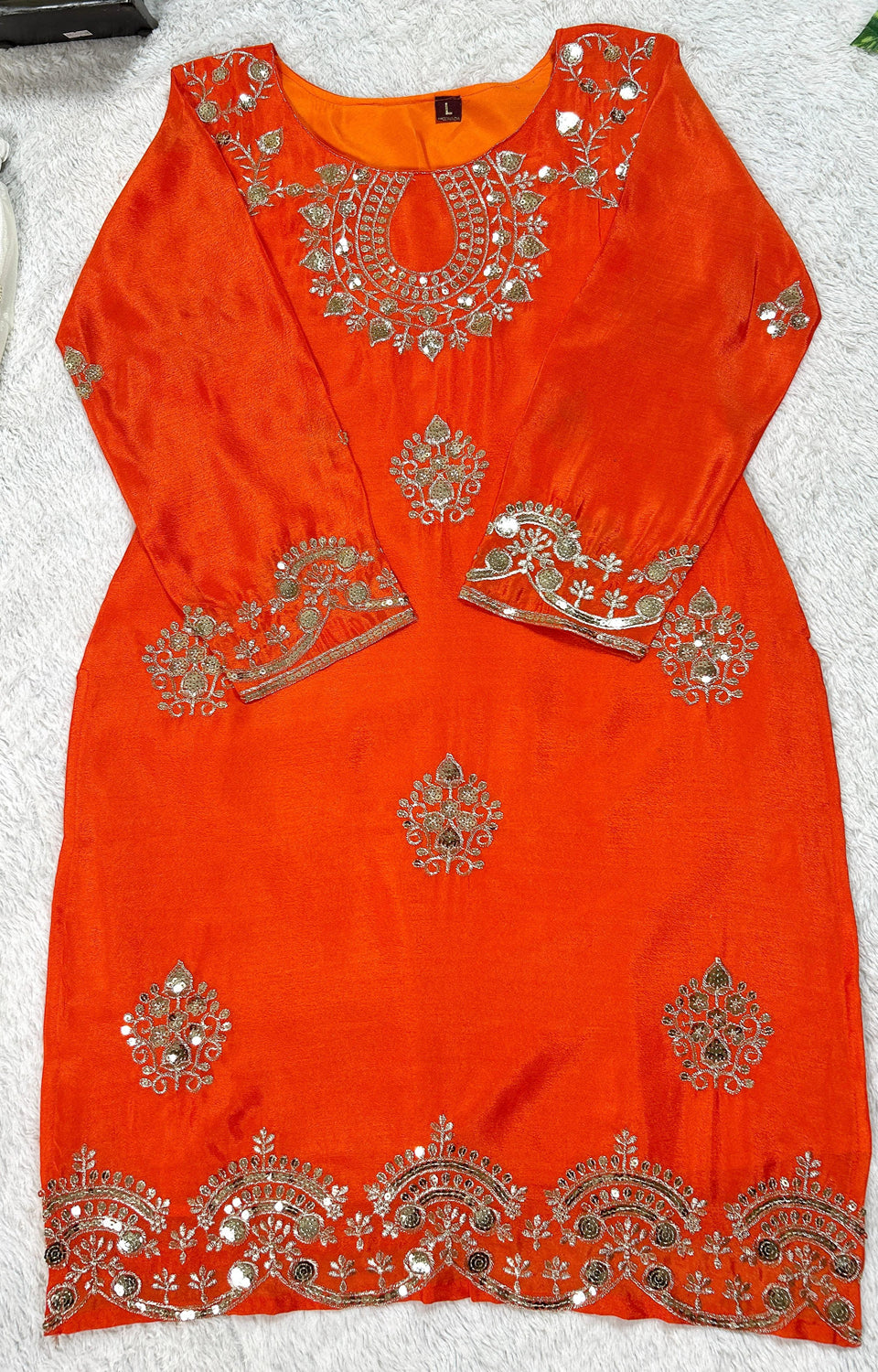 Vibrant Orange suit, contrasting garara, and stylish dupatta