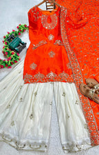 Vibrant Orange suit, contrasting garara, and stylish dupatta