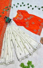 Vibrant Orange suit, contrasting garara, and stylish dupatta